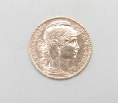 A 900. gold French 20 Francs coin, 1904, 6.5g