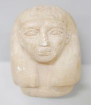 A carved alabaster sculpture, head of an Egyptian Pharoah, 10cm