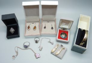 A collection of boxed silver jewellery