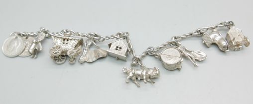 A silver charm bracelet, 47g