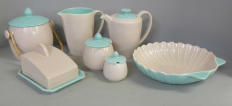 A collection of Poole twintone pink and green pottery