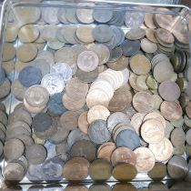 Assorted pennies, farthings and three penny bits and a collection of Victorian coins in a vintage