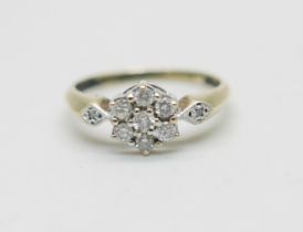 A 9ct gold and diamond cluster ring, 1.6g, L