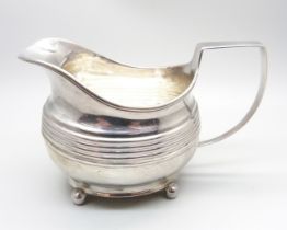 A Georgian silver jug, mark worn, 116g