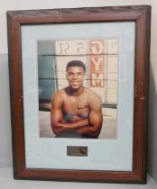 A framed presentation autograph of Muhammed Ali with certificate of authenticity numbered 993149