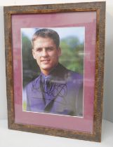 A signed picture of Michael Owen, framed