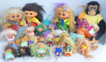 Twenty-nine Troll figures and a chimpanzee figure, (3 large, 26 small, chimpanzee hand a/f)