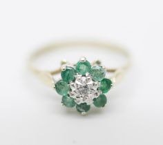 A 9ct gold, emerald and diamond cluster ring, 1.1g, L/M