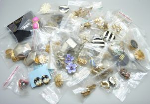 Sixty pairs of clip-on earrings