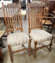 A pair of carved oak dining chairs