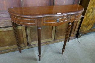 An inlaid mahogany console table
