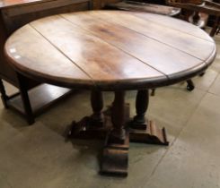 A mahogany circular centre table