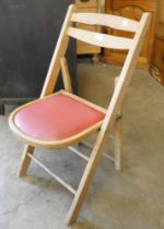 A beech folding chair