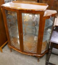 An early 20th Century walnut display cabinet