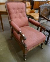 A gentleman's Victorian carved mahogany reclining armchair