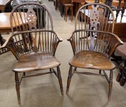 A pair of elm and beech wheelback Windosr chairs