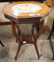 A mahogany octagonal side table with Chinese silk panel