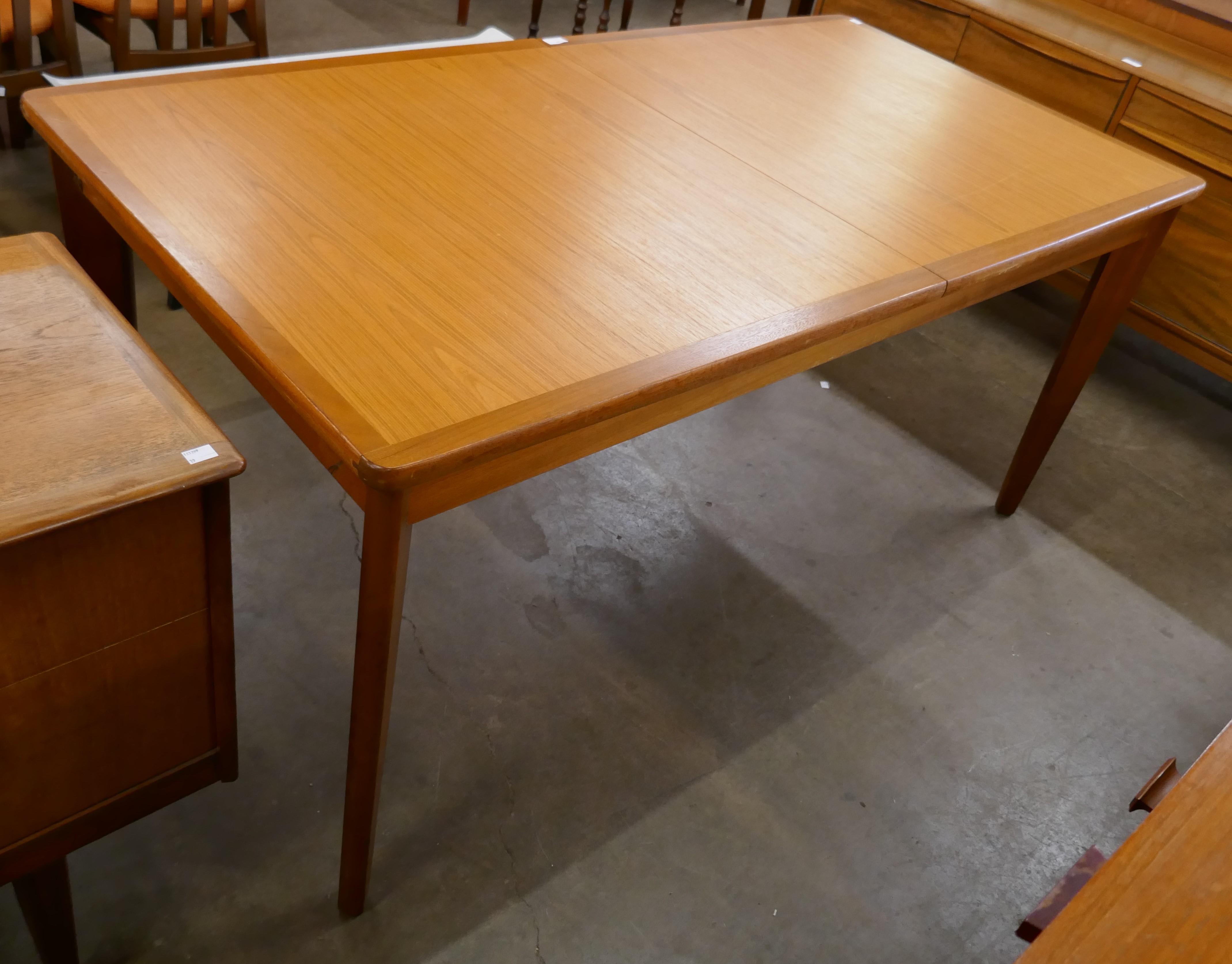 A teak extending dining table - Image 2 of 2