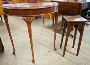 A mahogany demi-lune side table and an Edward VII inlaid mahogany plant stand