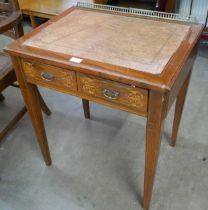 An Edward VII marquetry inlaid rosewood two drawer lady's writing table