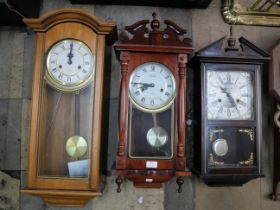 Three assorted wall clocks