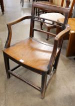 A 19th Century elm elbow chair