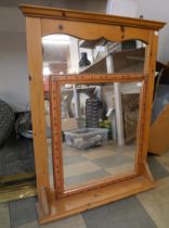 A pine wall hanging mirror and one other