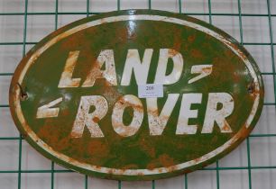 An enamelled Land Rover sign