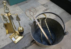 A brass companion set and a jam pan