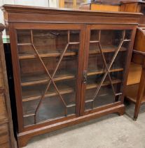 A mahogany two door bookcase