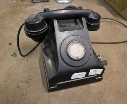 A Bakelite telephone, with plaque marked Ericsson Mining Table Telephone