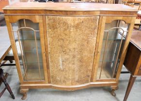 A Queen Anne style burr walnut breakfront side cabinet