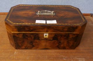 A walnut jewellery box with inlaid top, handle and mother of pearl escutcheon