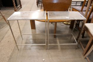 A pair of Italian style mirrored side tables