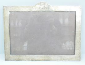 A silver photograph frame with inscription, 25.5cm x 36cm