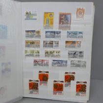 Stamps; world unmounted mint in 32 page stockbook, many in complete sets