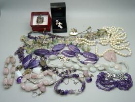 A collection of costume jewellery and a string of pearls