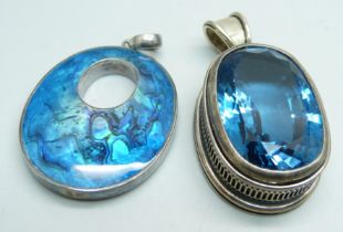 A large 925 silver mounted double sided pendant and one other large pendant set with a faceted