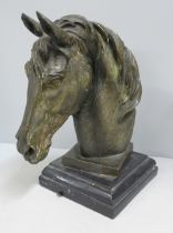 A mounted bronze horse's head, 30cm
