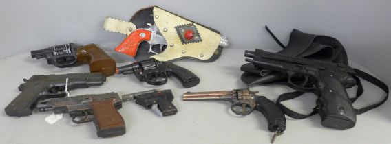 A collection of toy guns