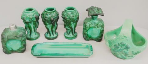 In the manner of Heinrich Hoffmann; seven items of malachite glass, three vases depicting raised
