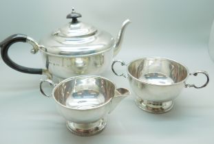 A three piece silver tea service, Birmingham 1958, 627g