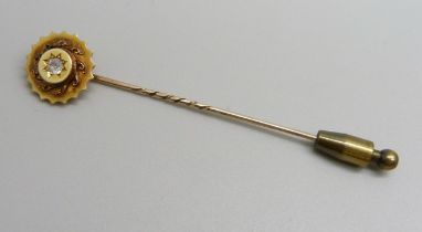 A c1900 diamond set stick pin, 2.6g, top 15mm diameter