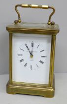 A Matthew Norman brass and four glass sided carriage clock with alarm and repeater