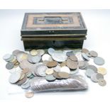 A collection of foreign vintage coins, English pennies