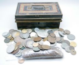 A collection of foreign vintage coins, English pennies