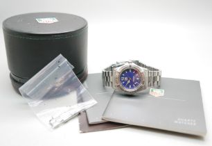 A Tag Heuer wristwatch, with paperwork, box and spare links, 37mm with crown