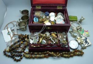 Costume jewellery, badges, etc., and a fob watch marked fine silver