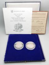 Two commemorative coins in a presentation box; 25th Wedding anniversary silver coins