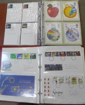 An album of 1990s stamps first day covers and an album of first day issue PHQ Post Office Picture